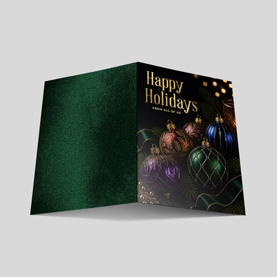 holiday card with colorful ornaments and green interior