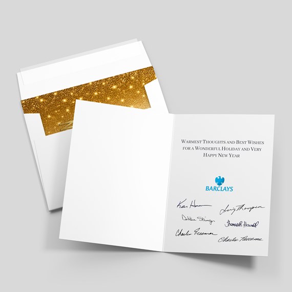 white greeting card with gold glitter lining, printed text, and blue logo