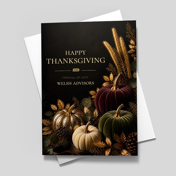 Thanksgiving card with decorative pumpkins and foliage
