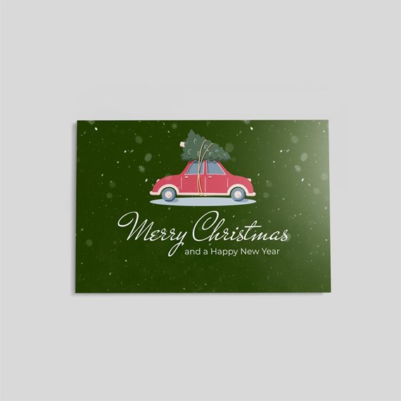 red car with tree, green background, snowflakes, holiday greeting