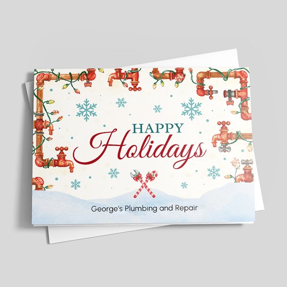 holiday card with plumbing motifs and customizable text area
