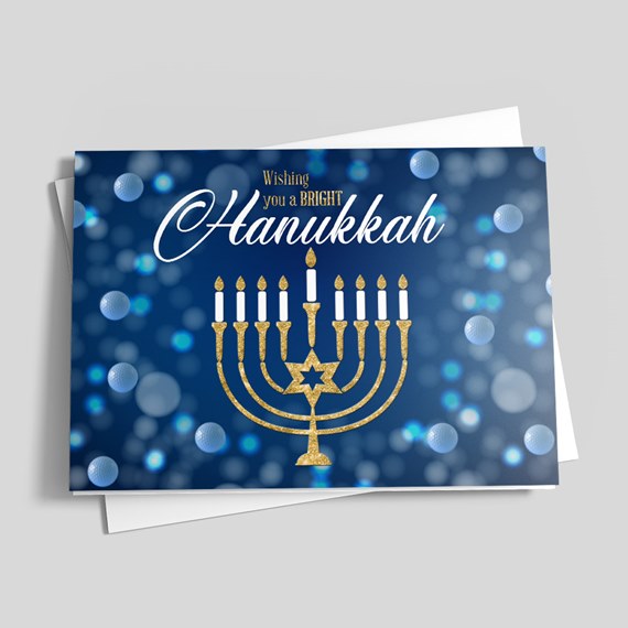 Hanukkah greeting card with menorah and bokeh background