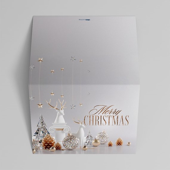 Christmas card design with reindeer, ornaments, and pine cones