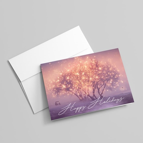 greeting card with tree design and happy holidays text