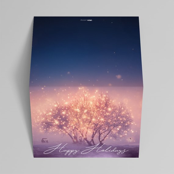 glowing tree with holiday text