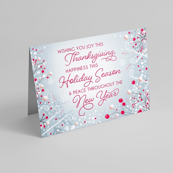holiday card with decorative branches and seasonal text