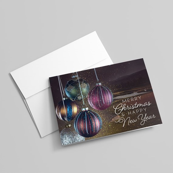 Christmas card with ornaments and text