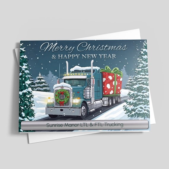 truck carrying gifts in snowy landscape with greeting text