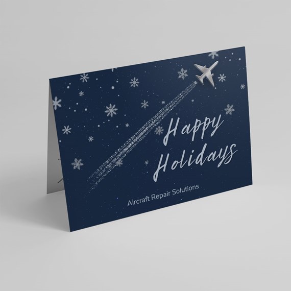 holiday card with airplane and snowflakes
