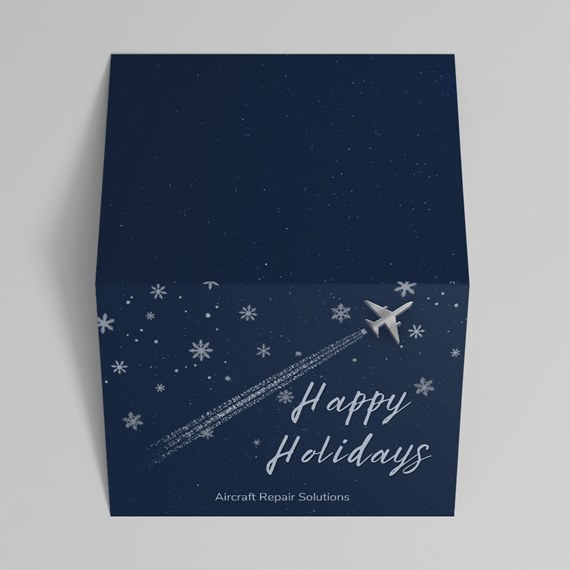 navy blue box with airplane and snowflakes, customizable text area