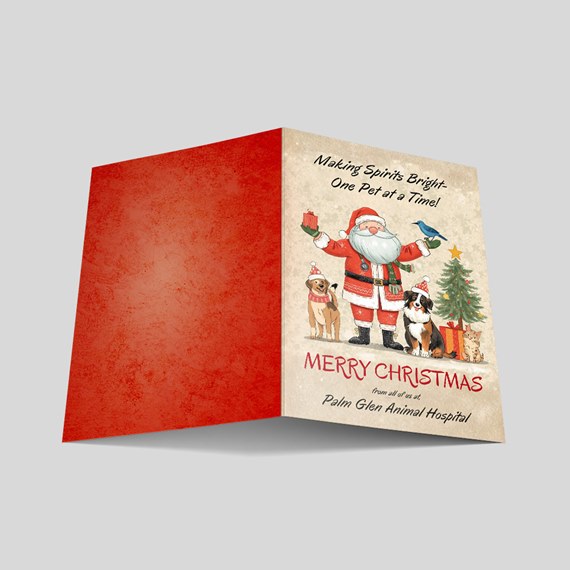 Christmas greeting card with Santa and dogs, red side
