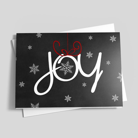 black card with joy text and snowflakes
