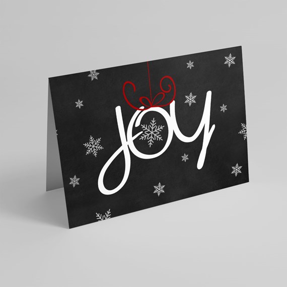 black card with joy text and snowflake design
