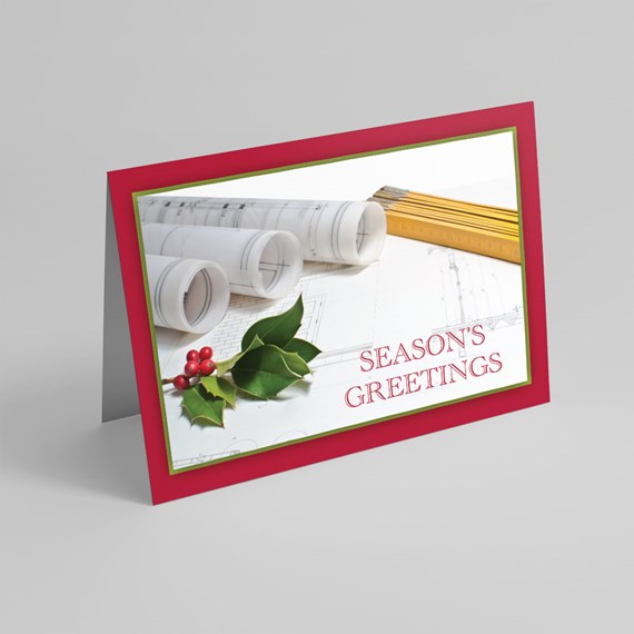 greeting card with blueprints and holly leaves, photo area