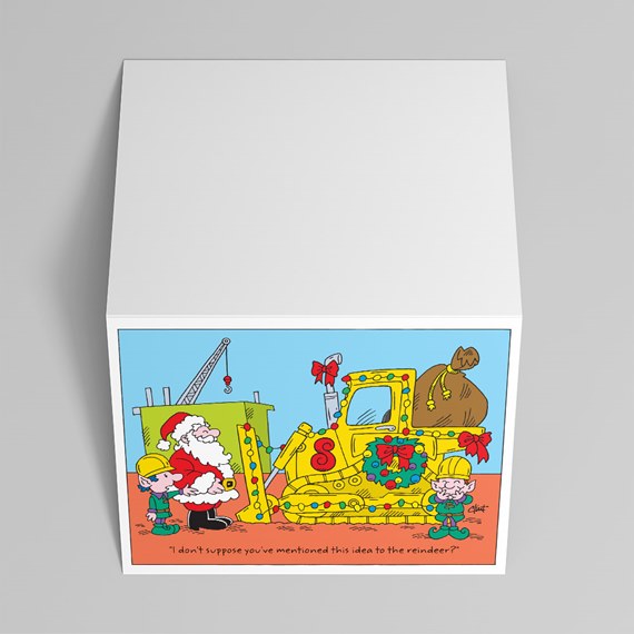 white gift box with cartoon Christmas scene of Santa, two elves and a wreath-decorated yellow bulldozer