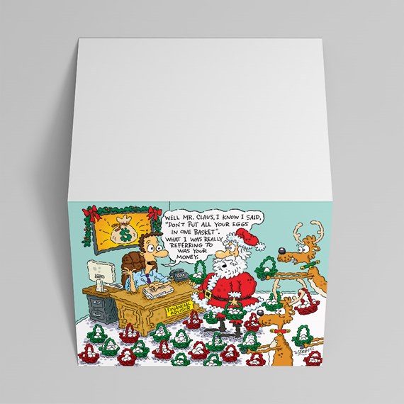Folded greeting card with cartoon of Santa at a financial advisor's office surrounded by red and green baskets and a speech bubble; blank white top.