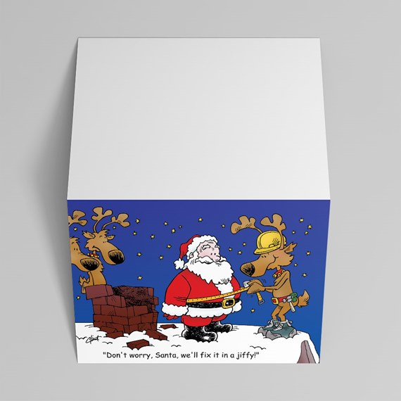 square memo cube with cartoon Santa and reindeer on blue background and humorous caption