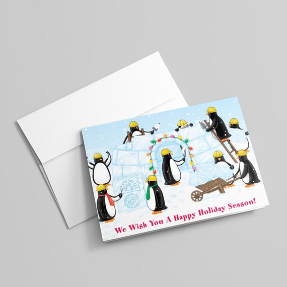 holiday card with penguins building an igloo and festive lights