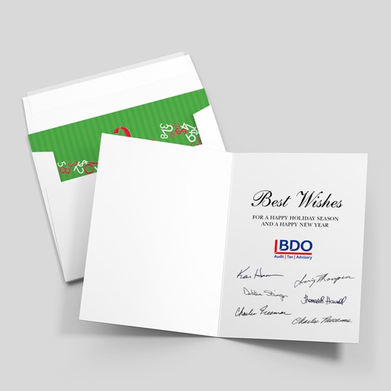 folded holiday greeting card and envelope with green patterned liner, white interior printed with "Best Wishes" message and signatures