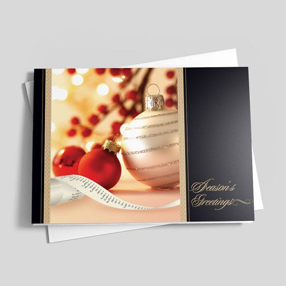 seasonal greeting card design with ornaments and ribbon