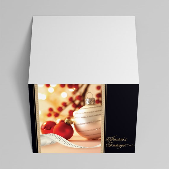 holiday card design with ornaments and ribbon