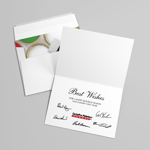 Folded white greeting card reading 'Best Wishes' with signature prints and envelope pocket showing paint cans