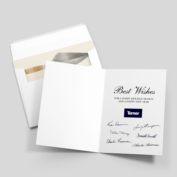 Open white greeting card with 'Best Wishes' text, small rectangular logo and multiple signatures, shown with envelopes