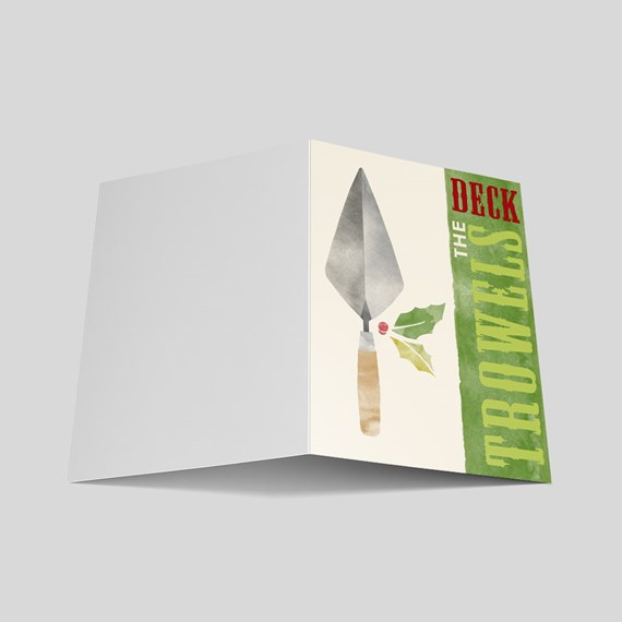 Folded holiday greeting card with watercolor trowel and holly next to a green vertical banner reading Deck the Trowels
