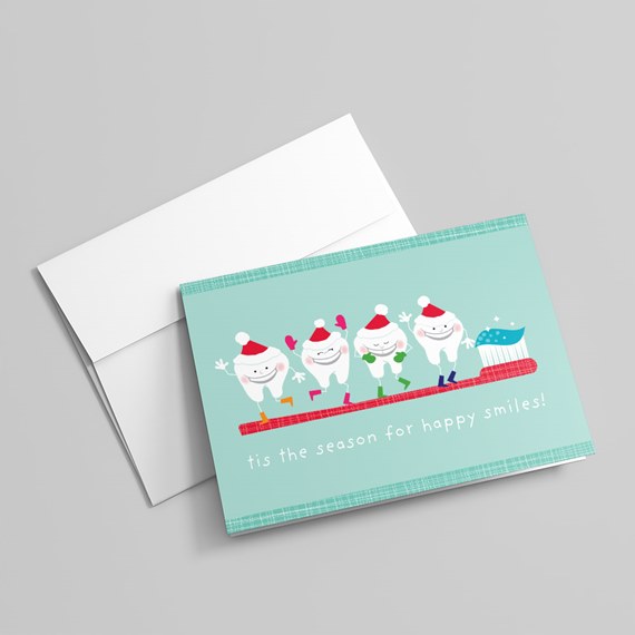 Holiday greeting card showing four cartoon teeth in Santa hats on a red toothbrush with toothpaste on a teal background