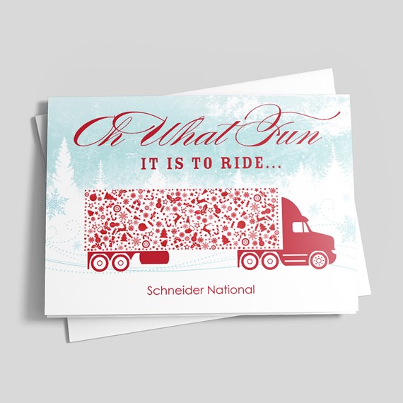 Holiday greeting card with red semi truck and patterned trailer on a pale blue snowy background