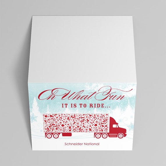 square holiday gift box with red semi truck graphic, light blue winter background and script "Oh What Fun It Is To Ride" text