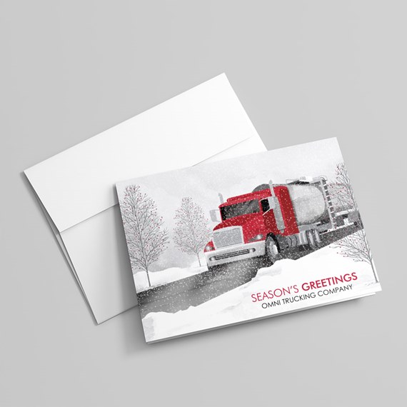 Holiday greeting card with red semi tanker truck illustration in snowy winter scene and blank envelope