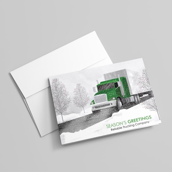 winter greeting card with green truck and snowy background