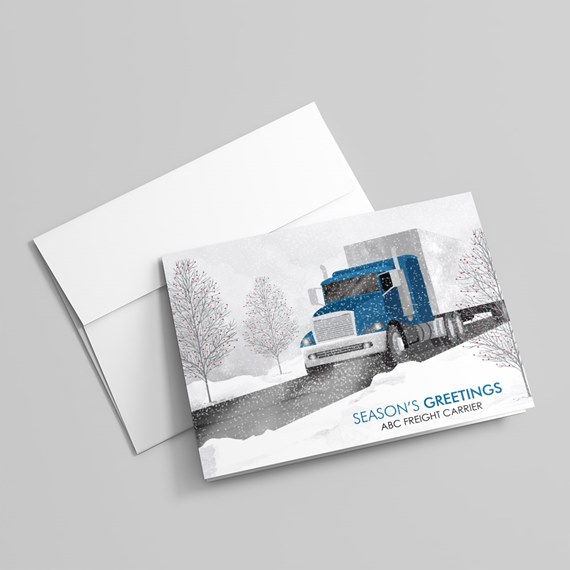 Holiday greeting card with blue semi truck in snowy landscape and envelope
