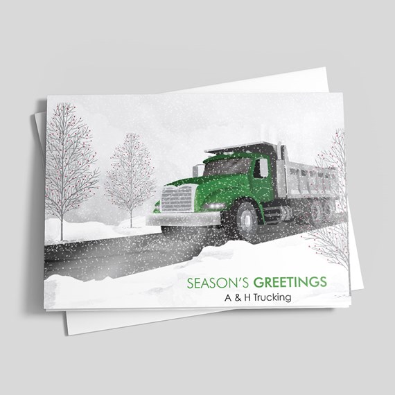 season's greetings card with truck and snowy landscape