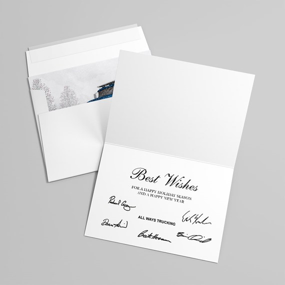 Folded white holiday greeting card with "Best Wishes" message, printed signatures and matching envelope showing a winter scene.