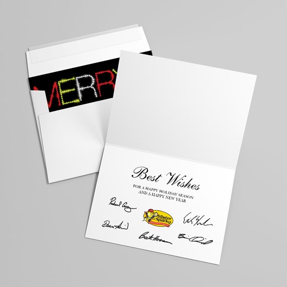 Open white folded greeting card reading 