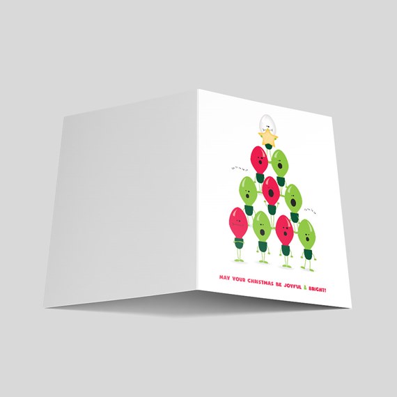holiday card with cartoon balloons in tree shape and festive text