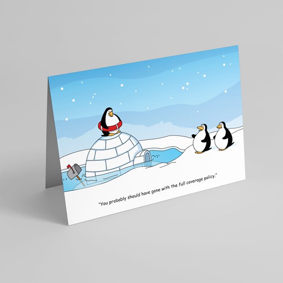 Folded greeting card with cartoon penguins, igloo, red life preserver and snowy blue sky with a humorous caption