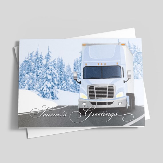 Greeting card with a semi truck on a snowy road and "Season's Greetings" text