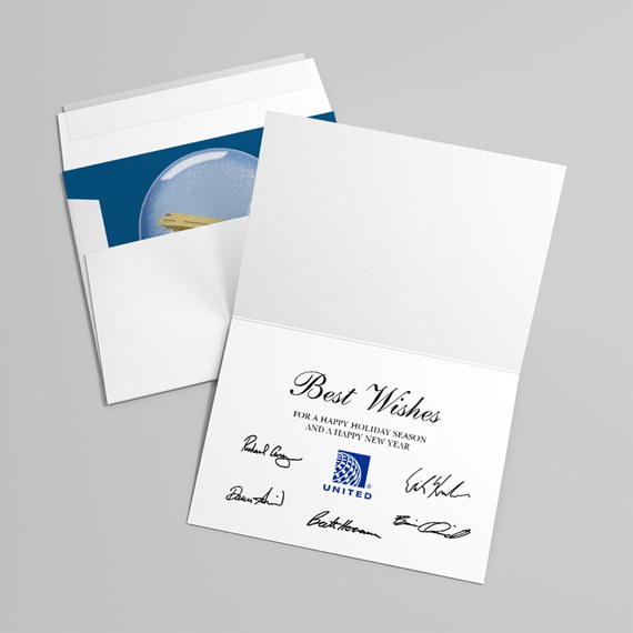 greeting card with snow globe illustration and printed text