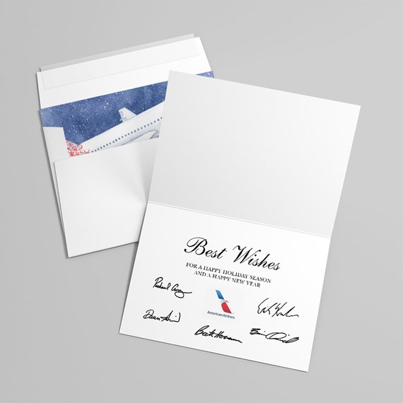 Folded white greeting card reading "Best Wishes" with signatures and envelope showing blue airplane liner