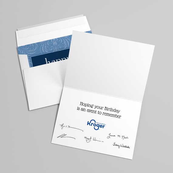 open birthday card with blue patterned inner design and printed message