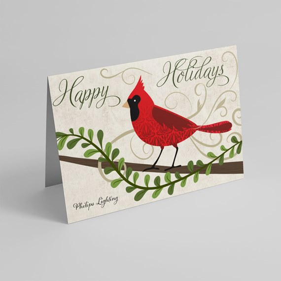 greeting card with cardinal and holiday text