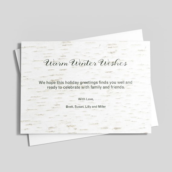 greeting card with warm winter wishes text and birch bark pattern