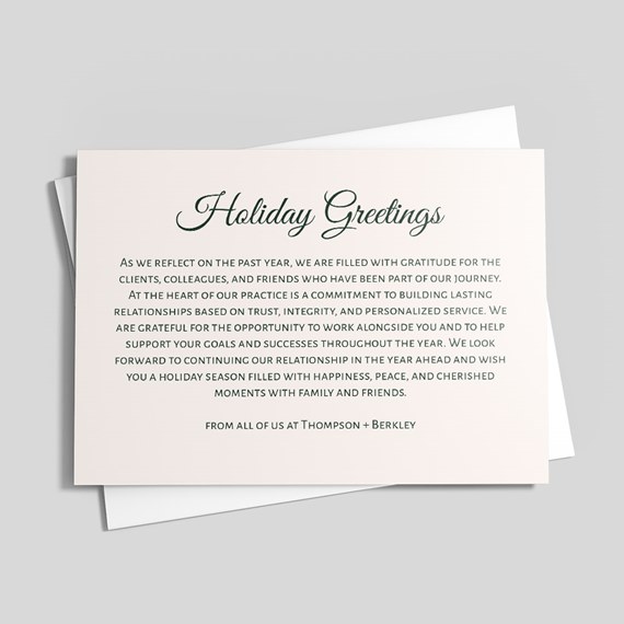 folded card with holiday greetings message